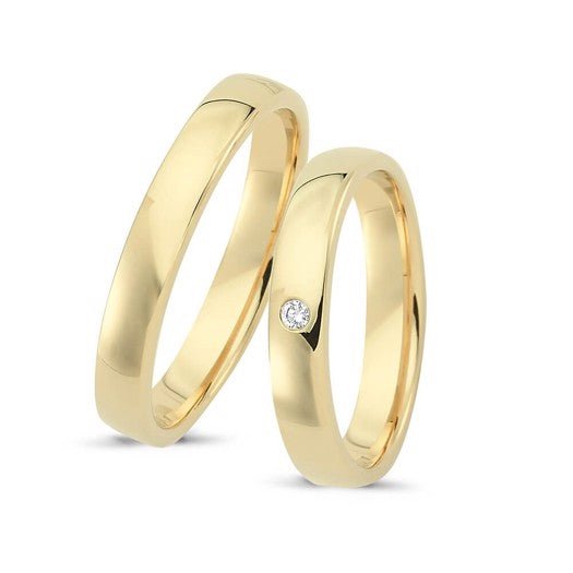 Tidløse Nuran vielsesringe i 8 kt guld med 1 diamant – klassisk ringesæt med én diamant i dameringen og maskulin herrering.